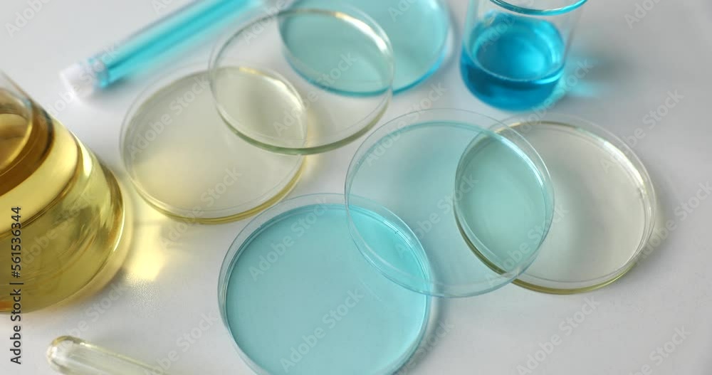 Scientific laboratory experimental glassware with transparent solution Scientific laboratory experimental glassware with transparent solution