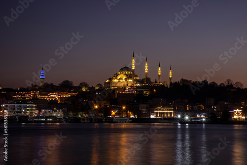 Sunset in Istanbul, Turkey with Suleymaniye Mosque and Fatih Mosque (Ottoman imperial mosque). View from Galata Bridge in Istanbul.