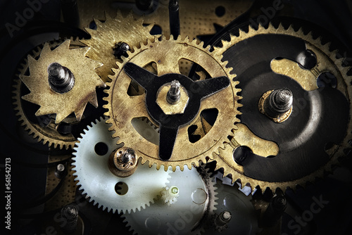 Gears of a vintage clock mechanism close-up
