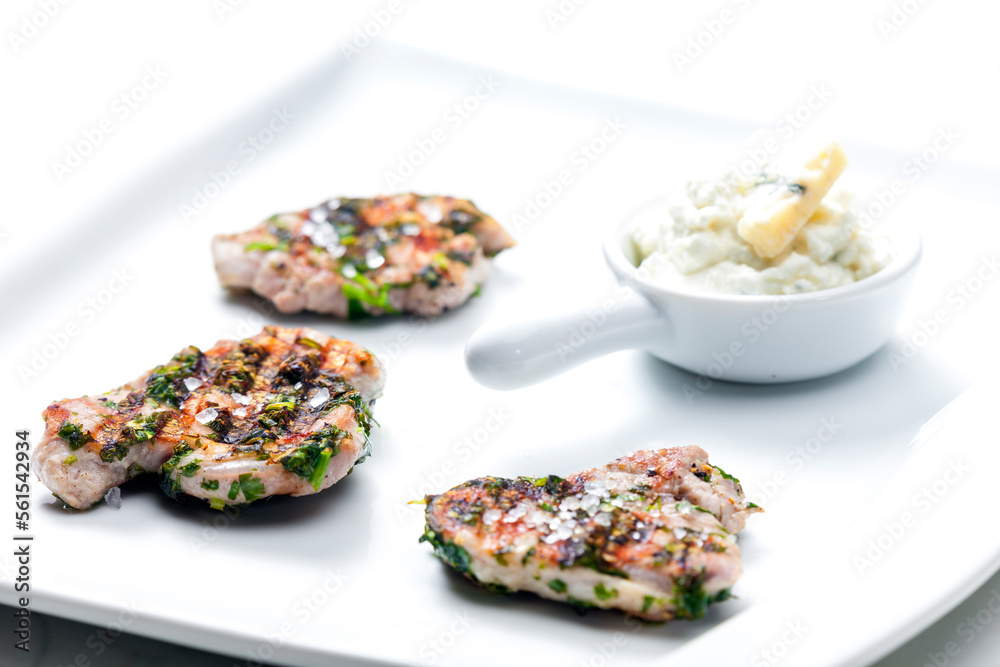 grilled poultry meat with herbs served with blue cheese dip grilled poultry meat with herbs served with blue cheese dip