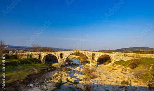 Pont Julien, roman stone arch bridge over Calavon river, Provence, France