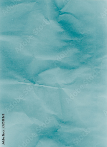 Creased paper texture. Distressed overlay. Wrinkled noise. Blue color grain dust scratches on light uneven rough abstract copy space background.