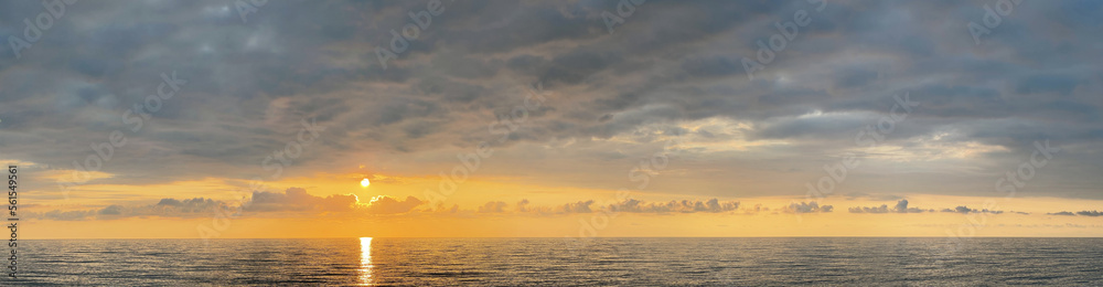Beautiful seascape panorama. Sea, sky, sun and cloud environment. Atmosphere cloudscape