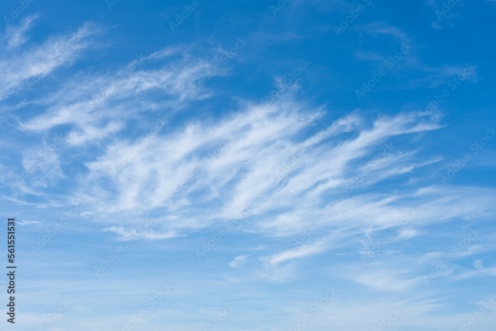 Cloudscape of white clouds in a blue sky