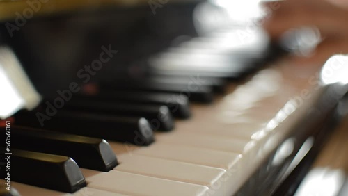 piano white keyboard. focus motion on the piano