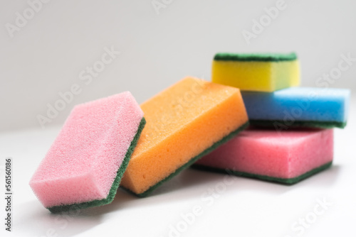 Kitchen dishcloth, cleanup concept, housework. Colorful kitchen sponges for cleaning close-up, housekeeping.
