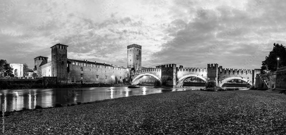 Verona, Veneto, Italy: The medieval old castle on the banks of River Adige at night in black and white Verona, Veneto, Italy: The medieval old castle on the banks of River Adige at night in black and white