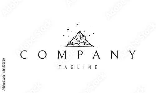 Vector logo on which an abstract image of a mountain with a tree inside against the background of stars.