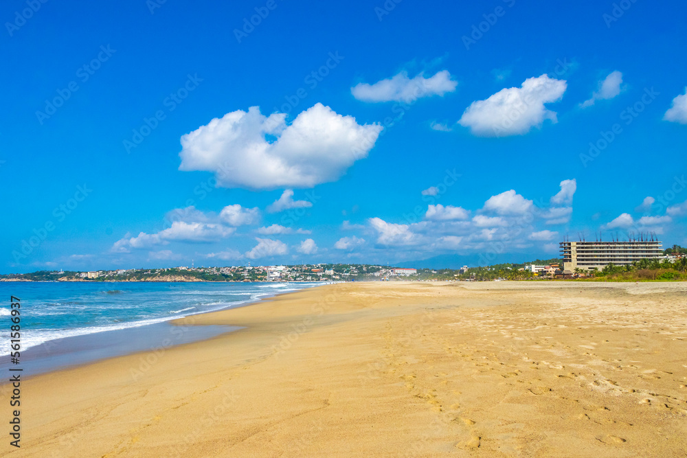 Beach sand blue water huge surfer waves Puerto Escondido Mexico. Beach sand blue water huge surfer waves Puerto Escondido Mexico.