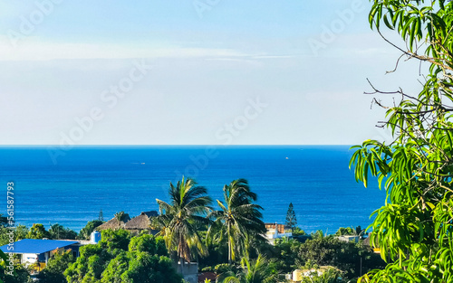 Beautiful natural panorama seascape palm trees beach Puerto Escondido Mexico.