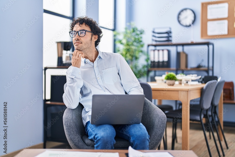 Young hispanic man business worker using laptop working at office Young hispanic man business worker using laptop working at office