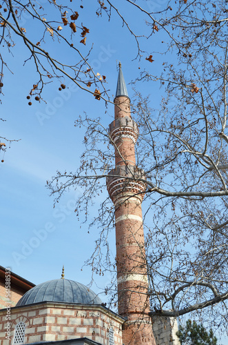 historical mosque minaret made of bricks photo