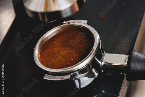 Process preparation black coffee for espresso maker machine, medium grinding top view