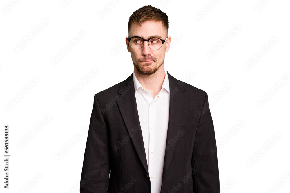 Young caucasian business man cutout isolated confused, feels doubtful and unsure. Young caucasian business man cutout isolated confused, feels doubtful and unsure.
