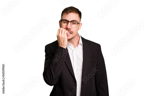 Young caucasian business man cutout isolated biting fingernails, nervous and very anxious.