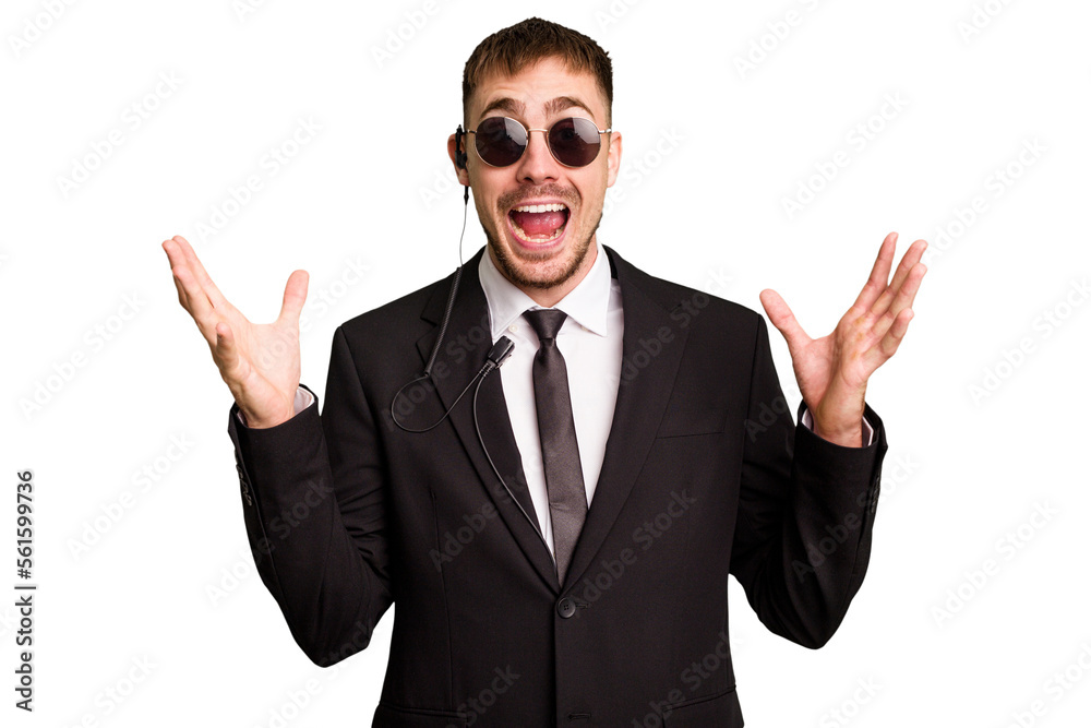 Security bodyguard man wearing a suit isolated cut out receiving a pleasant surprise, excited and raising hands. Security bodyguard man wearing a suit isolated cut out receiving a pleasant surprise, excited and raising hands.