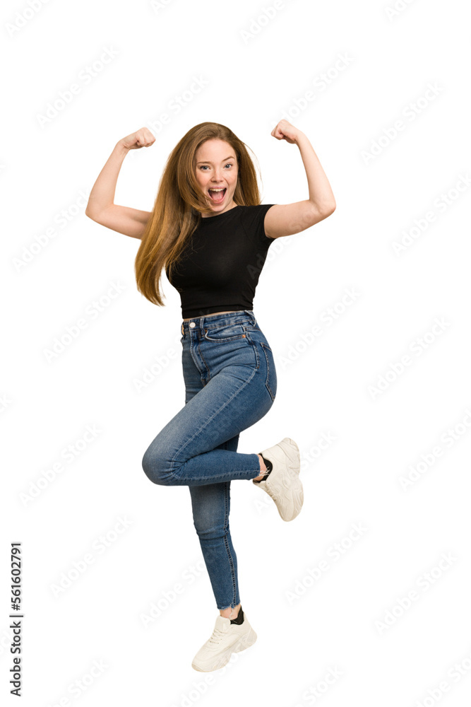 Young redhead woman jumping cut out isolated Young redhead woman jumping cut out isolated
