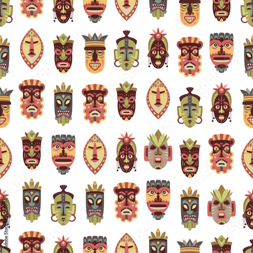 Ethnic african masks background. Wood mask tiki ritual. Art tribal hawaiian face totems. Colorful boho fabric print template, classy vector seamless pattern