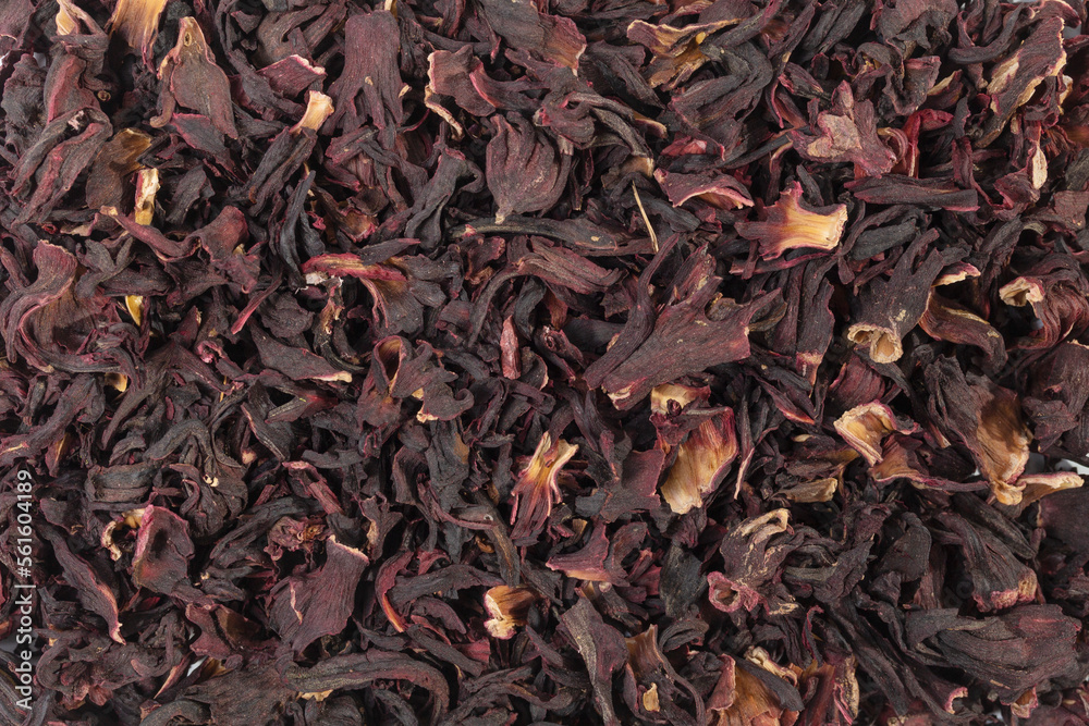 Dry hibiscus tea background. Dry hibiscus tea filling the frame.herb. herbal tea. food ingredient. Dry hibiscus tea background. Dry hibiscus tea filling the frame.herb. herbal tea. food ingredient.