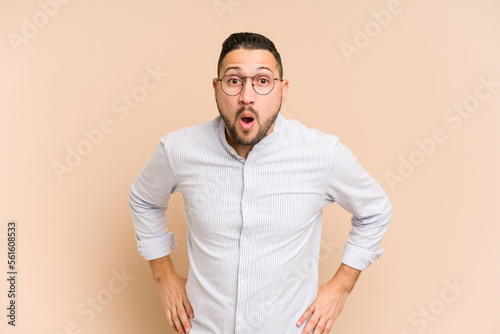 Adult latin man cut out isolated being shocked because of something she has seen.