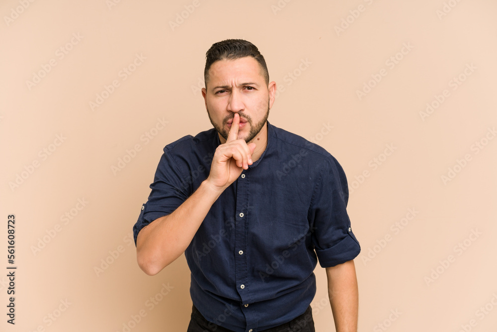 Adult latin man cut out isolated keeping a secret or asking for silence. Adult latin man cut out isolated keeping a secret or asking for silence.