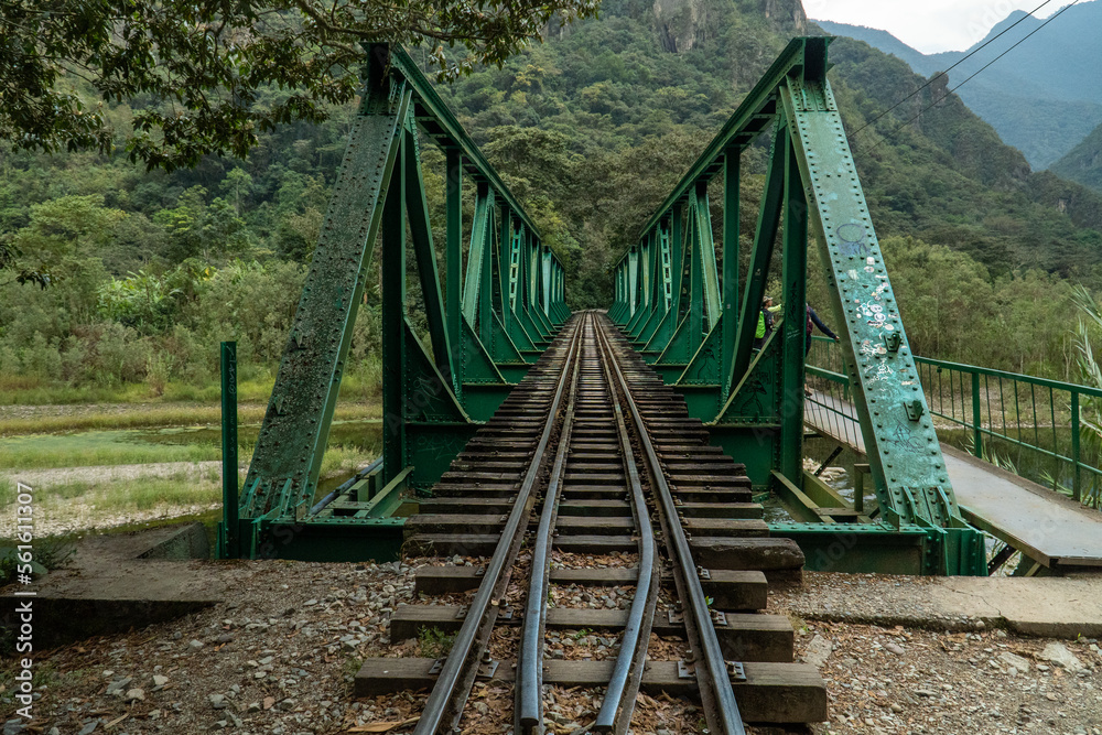 Green Metal Bridge in Aguas Calientes, Peru along Inca Trail to Machu Picchu Green Metal Bridge in Aguas Calientes, Peru along Inca Trail to Machu Picchu