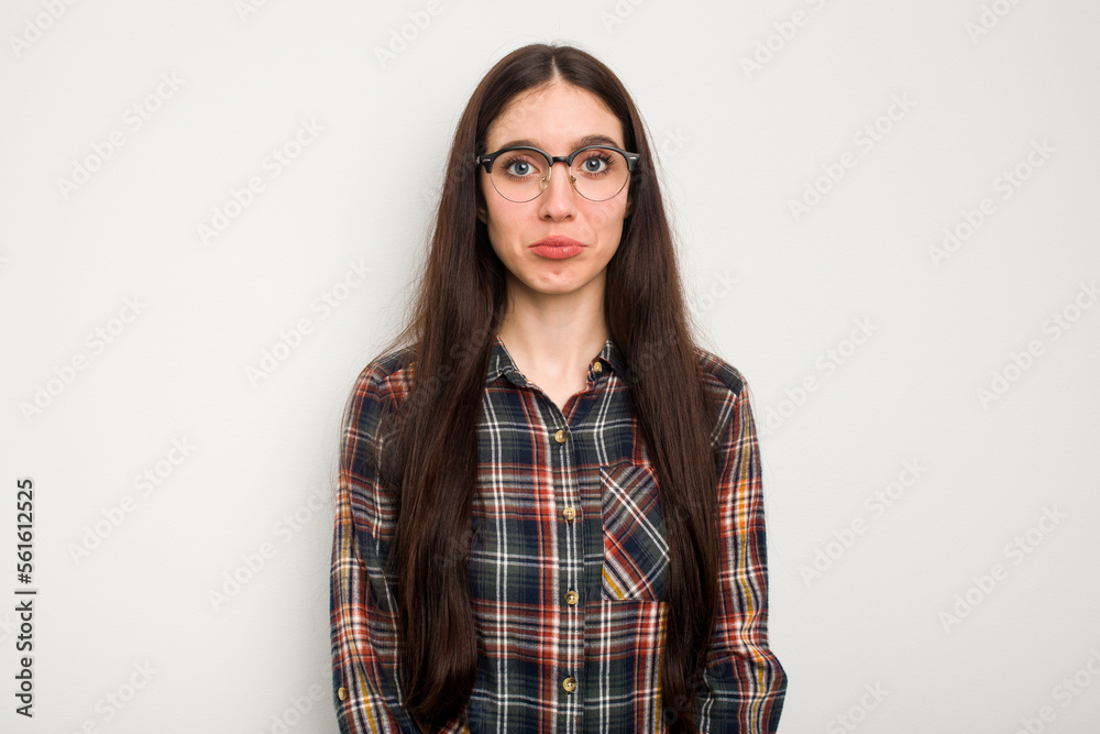 Young caucasian woman isolated on white background sad, serious face, feeling miserable and displeased. Young caucasian woman isolated on white background sad, serious face, feeling miserable and displeased.