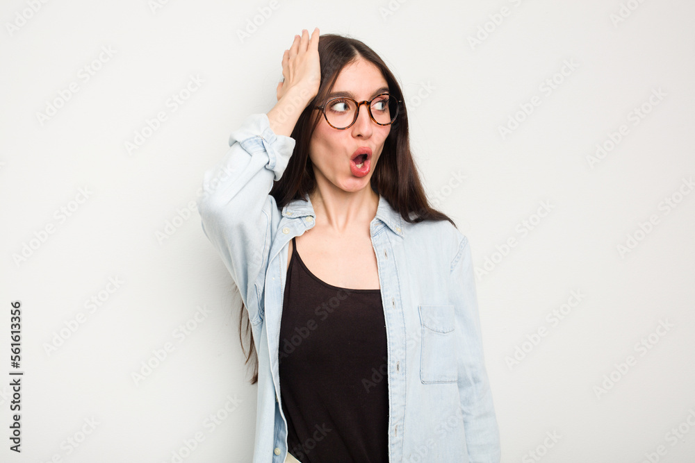 Young caucasian woman isolated on white background being shocked, she has remembered important meeting. Young caucasian woman isolated on white background being shocked, she has remembered important meeting.