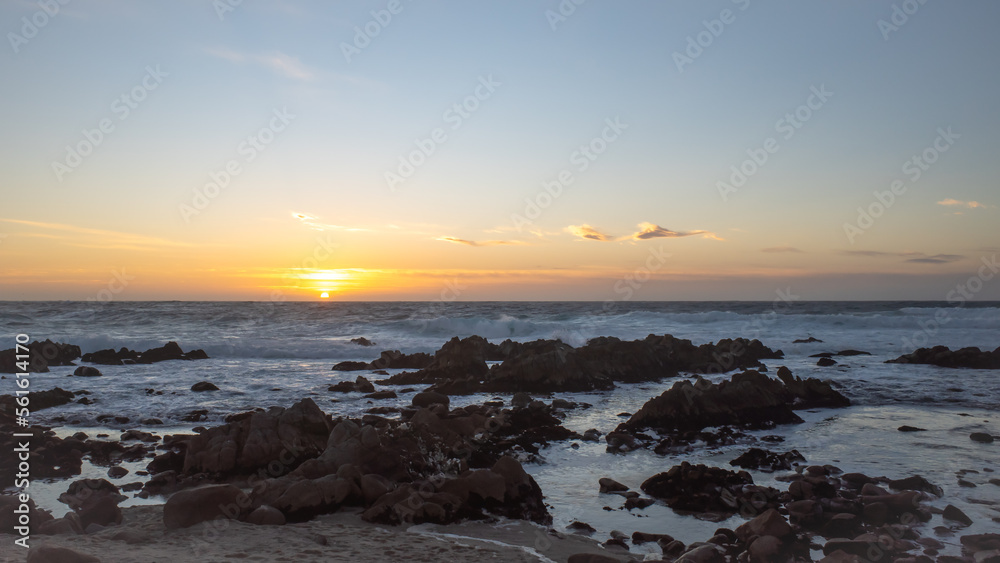 Beautiful sunset on the rocky beach of Pacific Grove in the Monterey Bay, California