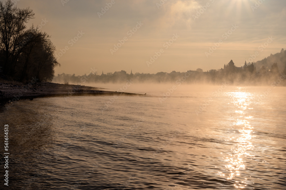 Steam rising from Rhine river near Unkel, Germany in winter Steam rising from Rhine river near Unkel, Germany in winter