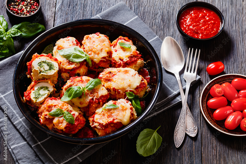 tasty chicken rollatini in tomato sauce, top view tasty chicken rollatini in tomato sauce, top view