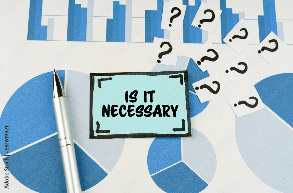 Ταπετσαρία On the blue diagrams lies a pen, questions and a sticker with the inscription -