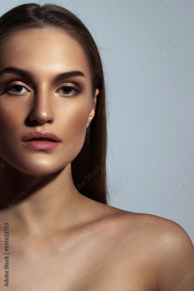 Beautiful tanned girl with perfect straight dark hair. Perfect skin, natural makeup Beautiful tanned girl with perfect straight dark hair. Perfect skin, natural makeup