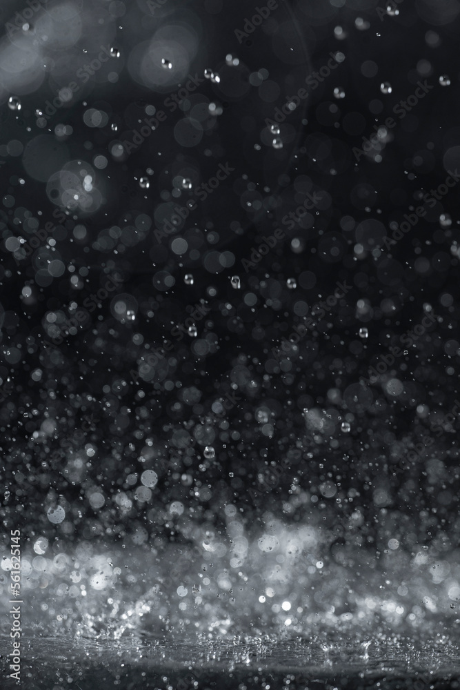 Macro photography of rain on a black background. Abstract background. Macro photography of rain on a black background. Abstract background.