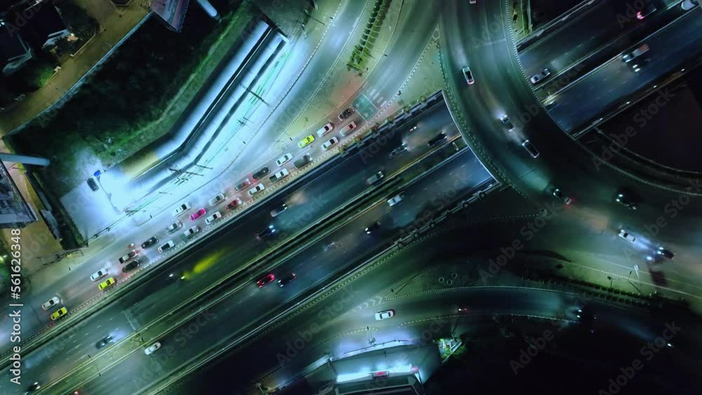 Aerial view of road interchange or highway intersection of Expressway top view, Road traffic an important infrastructure, car traffic transportation above intersection road Aerial view of road interchange or highway intersection of Expressway top view, Road traffic an important infrastructure, car traffic transportation above intersection road