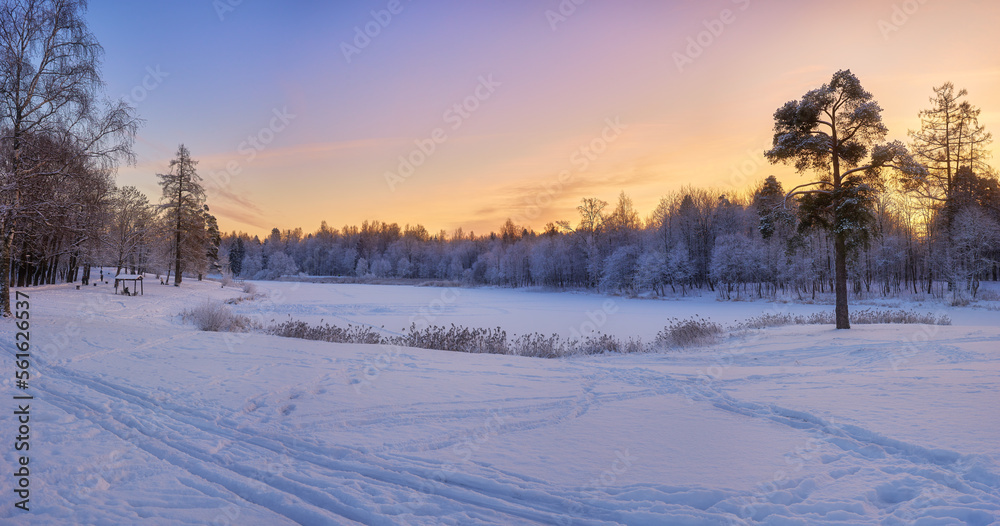 sunset panorama overlooking the frozen lake