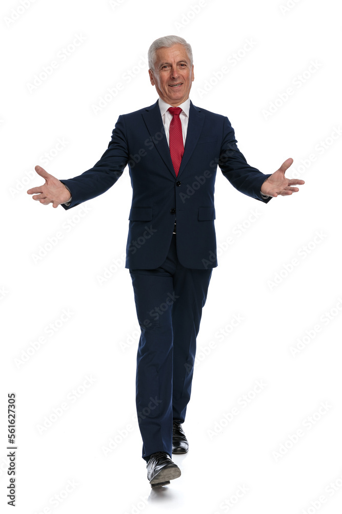 businessman walking towards the guests and greeting them businessman walking towards the guests and greeting them