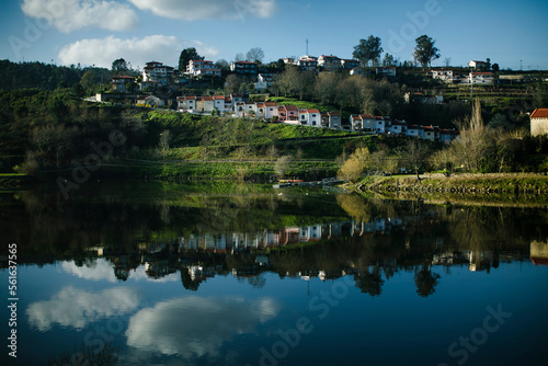 View of cottages on the banks of the Douro River, after the rain. Portugal.