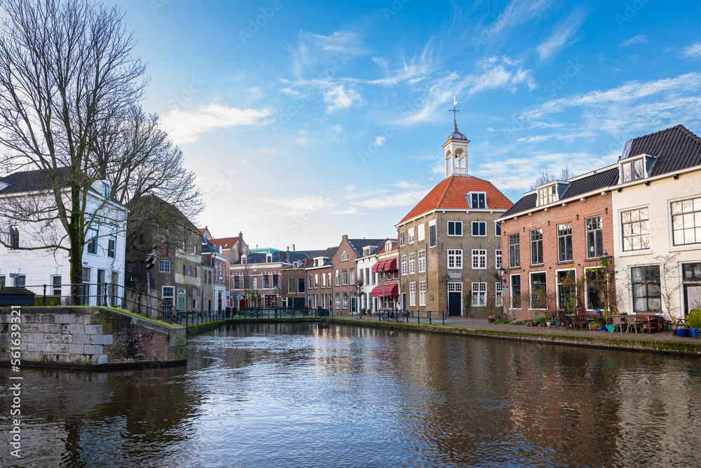 Scenic view of The Porters' Guild House along a canal in the historic town of Schiedam, Netherlands