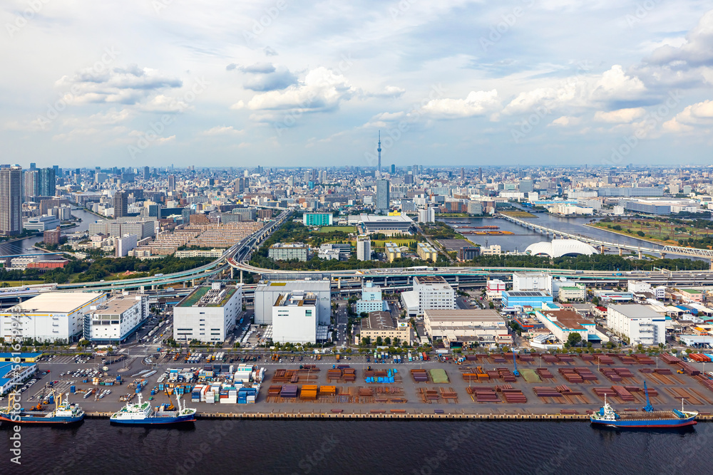 Obraz premium Aerial view of Odaiba Harbor shipping freight docks in Minato City, Tokyo, Japan