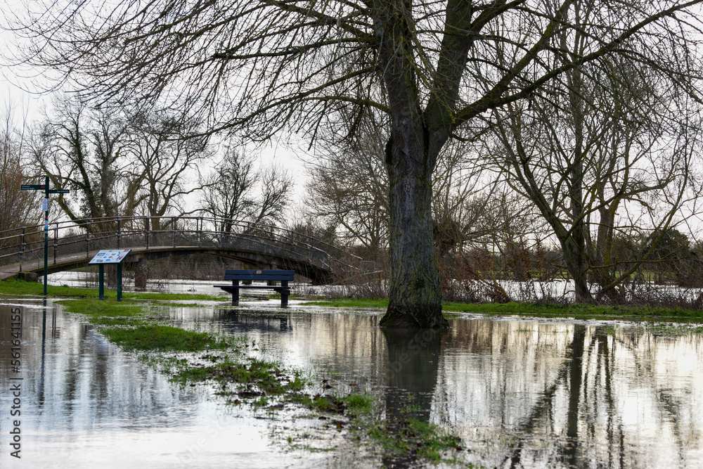 Obraz premium Flood water in a public park after the river banks burst from heavy rain