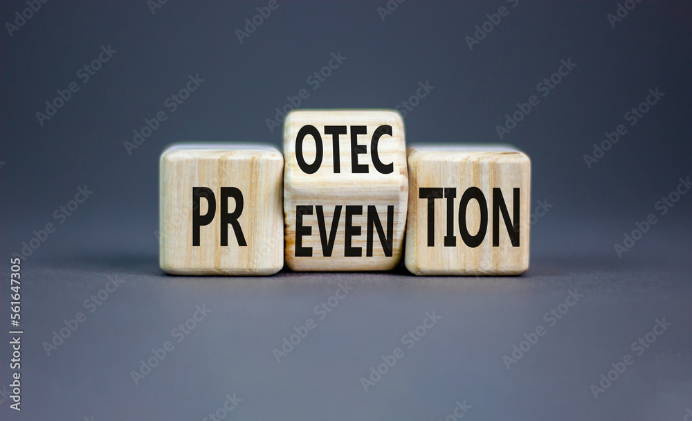 Protection and prevention symbol. Concept word Protection Prevention on wooden cubes. Beautiful grey table grey background. Business and rotection and prevention concept. Copy space. Protection and prevention symbol. Concept word Protection Prevention on wooden cubes. Beautiful grey table grey background. Business and rotection and prevention concept. Copy space.