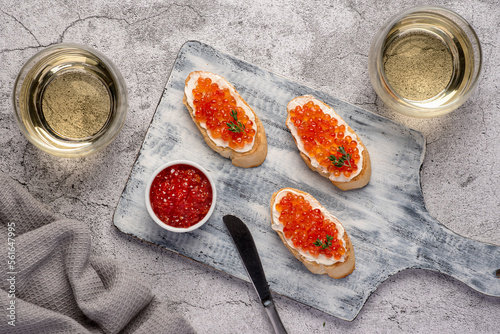 Food photography of sandwich with caviar, thyme, white wine, starter, delicacy 