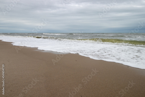 Waves and clouds at the beach