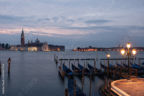 Evening view of gondolas on the wave and San Giorgio Maggiore, Venice