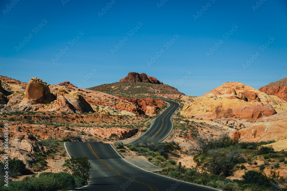 Road winding through the Desert Landscape Road winding through the Desert Landscape