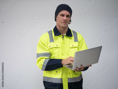 foreman engineer male labor staff employee man wear uniform safety helmet construction holding notebook tablet technology digital online network communication look camera white background copy space © StreetOnCamara