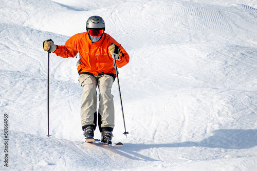 People are enjoying mogul skiing snow boarding photo