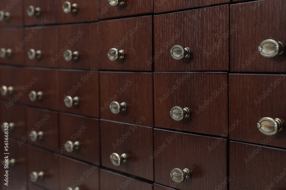 Library catalog. Wooden chest of drawers, closeup Library catalog. Wooden chest of drawers, closeup