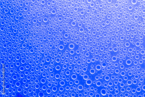  bubbles texture in blue tones.beautiful background with circles. Indigo pattern with white circles.macro Bubbles set.